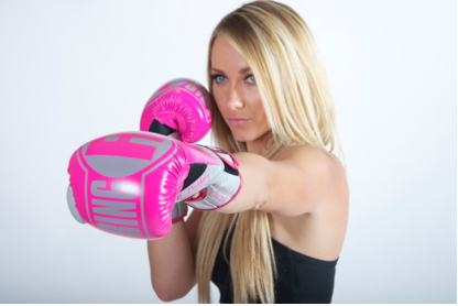 woman pink boxing gloves