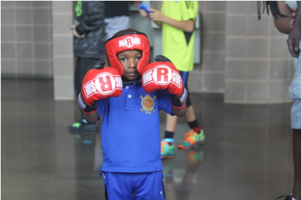 boy wearing ringside boxing gear