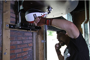 man punching speed bag