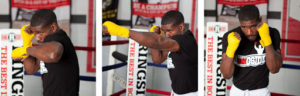 Shadowboxing in the ring with yellow handwraps