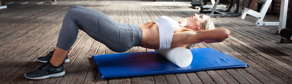 Using a foam roller to relieve tension and tightness in the thoracic spine area.
