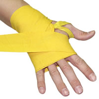 Step 3 for wrapping a hand using a standard hand wrap