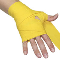 Step 5 for wrapping a hand using a standard hand wrap