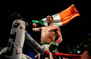 Michael Conlan holds Irish flag after defeating Tim Ibarra in 2017