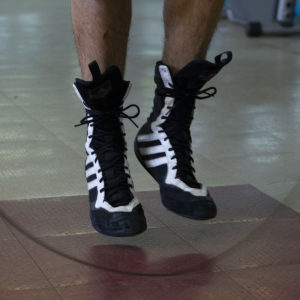 close up on feet jumping rope for boxing footwork