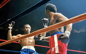 George Foreman has just struck Ken Norton with a knock down blow.